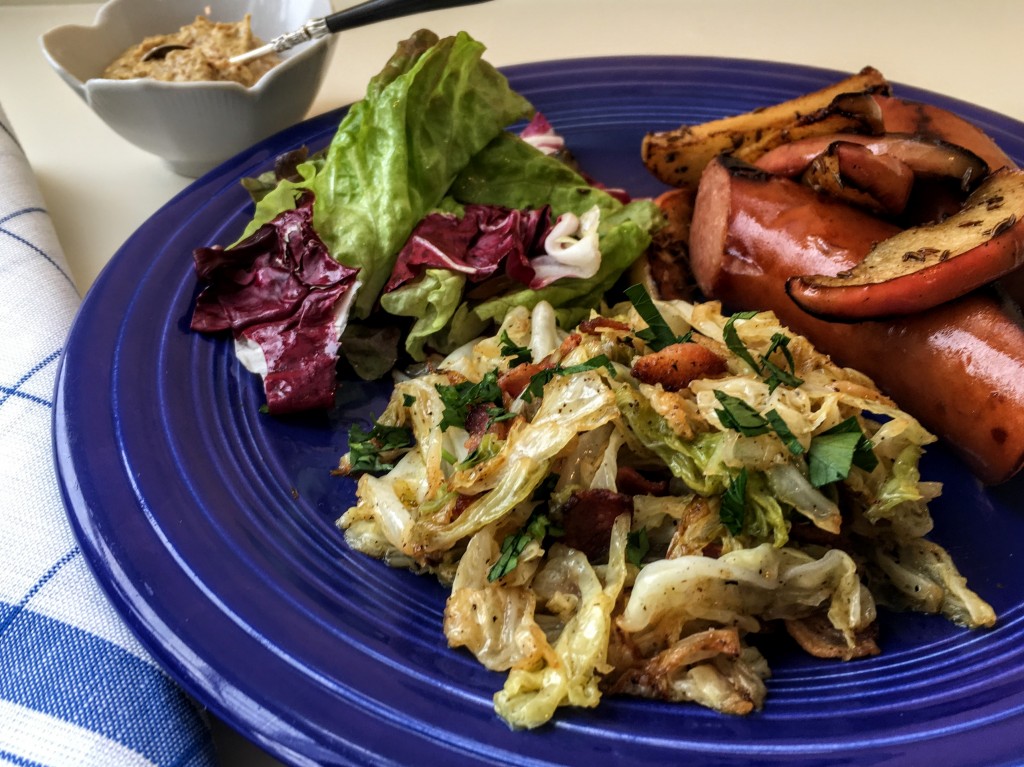 Grilled Sausages, Savoy Cabbage and Bacon, Apples with Caraway Seeds